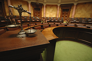 Courtroom with a scale in the forefront